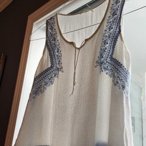 White sleeveless top